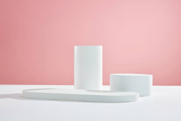 istock Pink background with circle , square white podium and blank space for advertising , abstract content , front view 1407959446