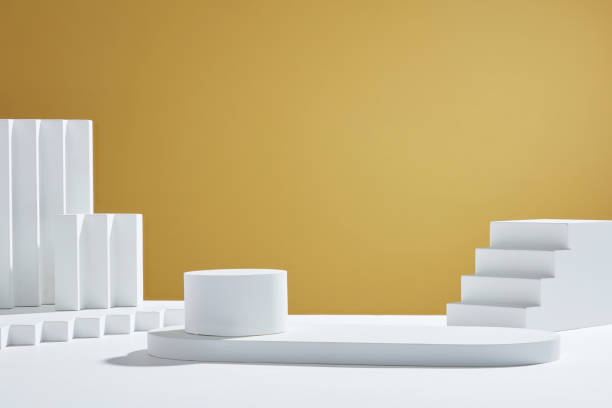 istock Yellow background with circle , square white podium and blank space for advertising , abstract content , front view 1407959476