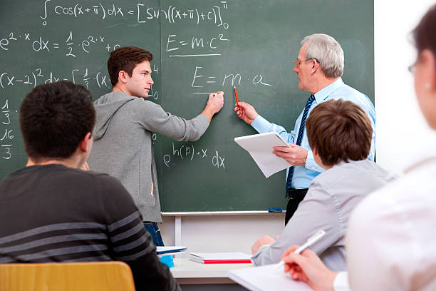 istock teacher and the  high school students 140795951