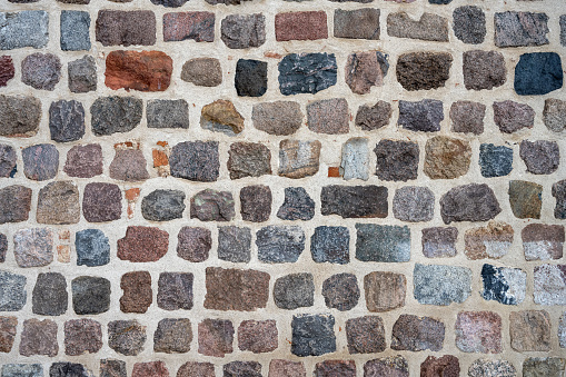 Background from a natural stone wall of an old building