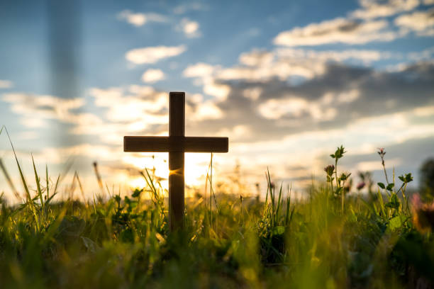 istock Wooden cross at sunset 1407966551