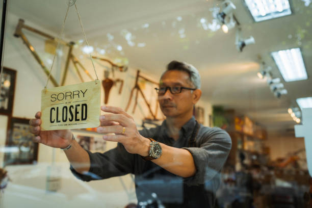 istock Bicycle shop owner closed the shop. 1407967957