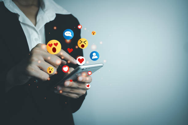 istock Concept of using digital media, technology, social media online surfing, woman's hand using smartphone to use the internet, work from home for social distancing. 1407970369