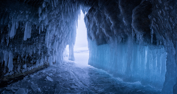 ice caves over frozen lake