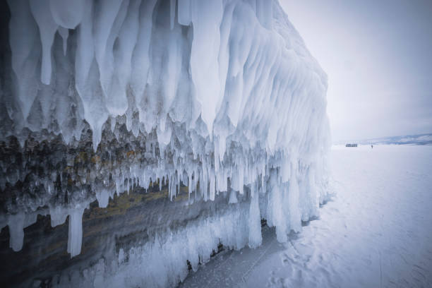 istock Ice caves over frozen lake 1407971430