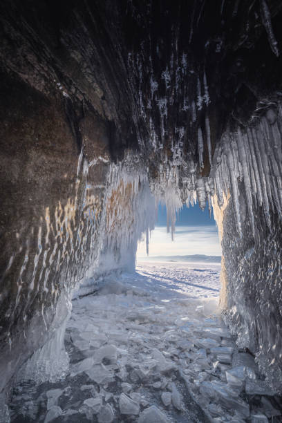 ice caves over frozen lake