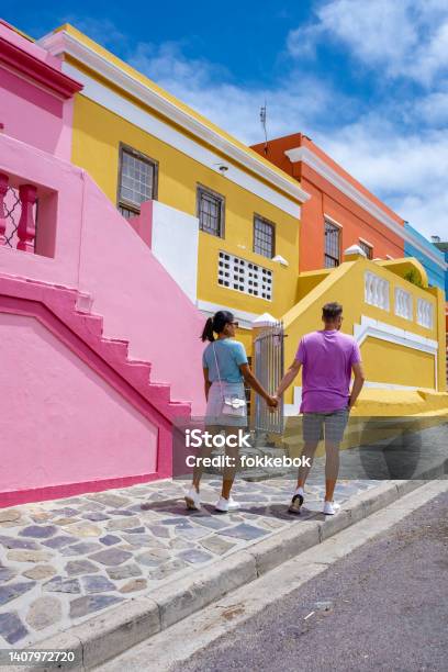 Bo Kaap Township In Cape Town Colorful House In Cape Town South Africa Bo Kaap Couple Man And Woman On A City Trip In Cape Town Stock Photo - Download Image Now