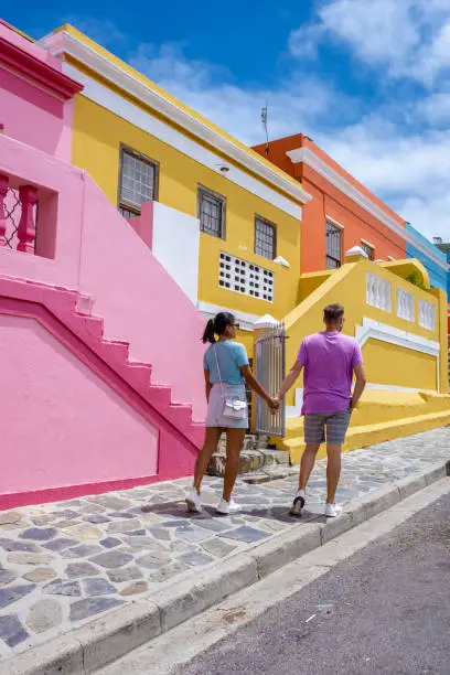 Photo of Bo Kaap Township in Cape Town, colorful house in Cape Town South Africa. Bo Kaap, couple man and woman on a city trip in Cape Town