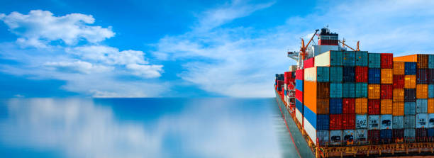 istock Stern of large cargo ship import export container box on the ocean sea on blue sky back ground concept transportation logistic and service to customer and supply change 1407975972