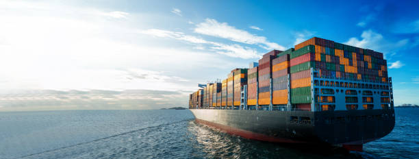 istock Stern of large cargo ship import export container box on the ocean sea on blue sky back ground concept transportation logistic and service to customer and supply change 1407976121