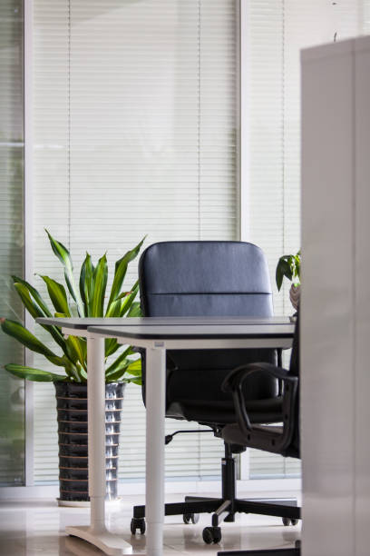 istock Modern office interior with armchair and desk 1407976989
