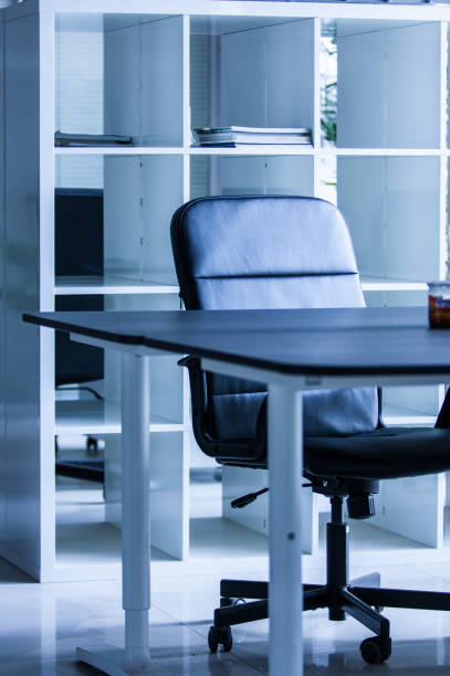 istock Modern office interior with armchair and desk 1407977005