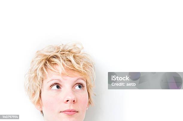 Blond Girl Looking Up Right Stock Photo - Download Image Now - 20-29 Years, Looking Up, One Woman Only