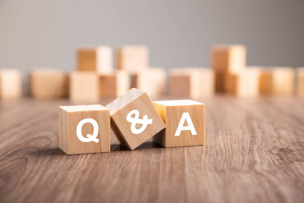 istock Three wooden cubes with the letters Q and A. 1407981275