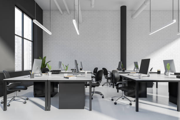 istock Office loft interior with pc computer, desk and panoramic window on city view 1407982598
