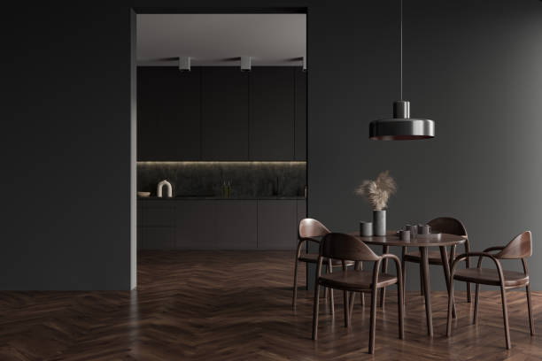istock Grey kitchen interior with eating table and seats, shelves and kitchenware 1407983660