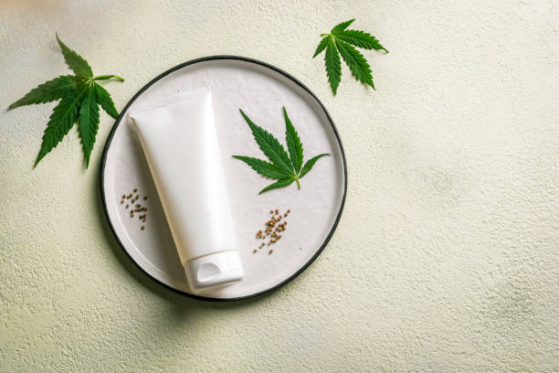 istock Hemp cannabis leaves and beauty product 1407983916