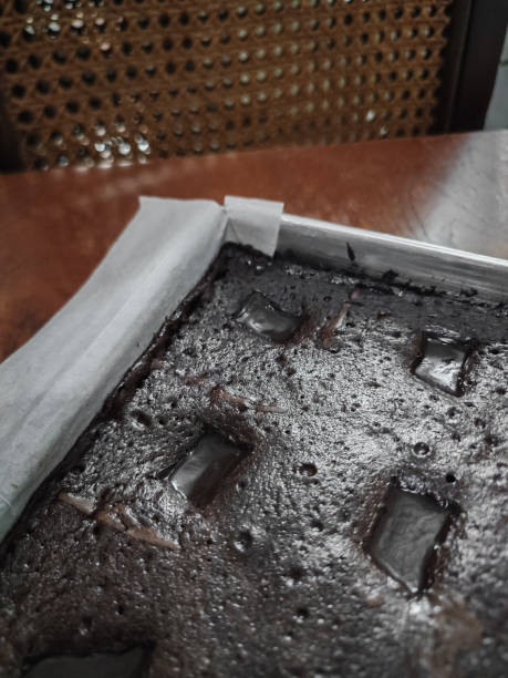 istock Brownie cake in a pan on a wooden table 1407985411