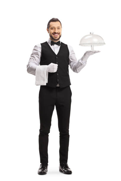 istock Smiling waiter holding an empty cake plate 1407987698