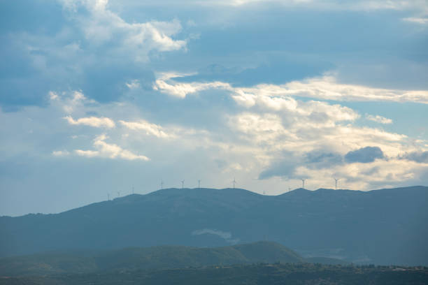 wind plant green energy at Greece mountains copy space