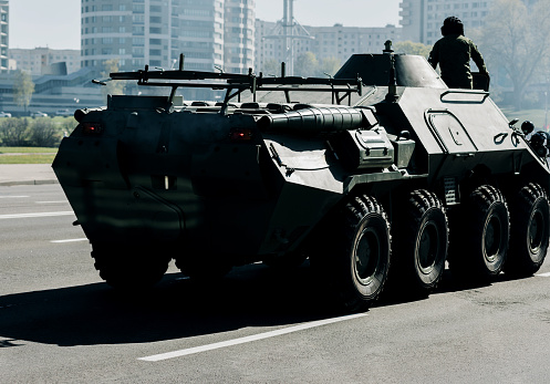 military armored personnel carrier on asphalt. military equipment. btr