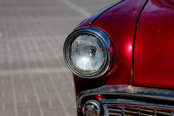 istock headlight of vintage automobile 1407991746