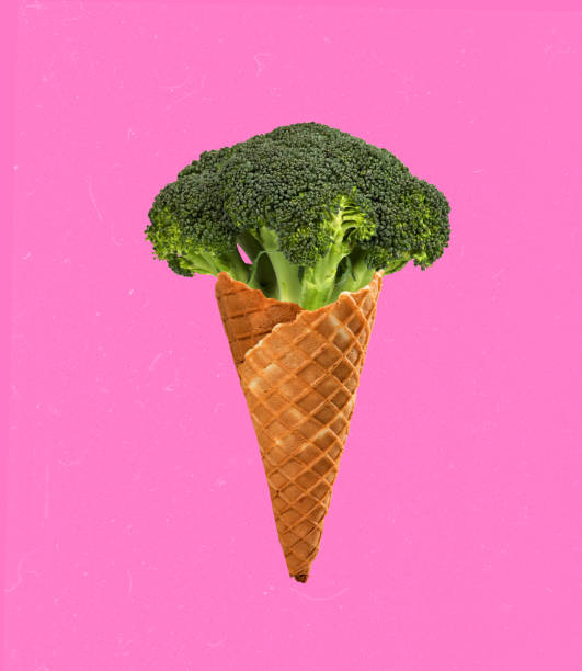 istock Contemporary art collage. Creative colorful design with broccoli inside ice cream cone isolated on pink background. Healthy eating 1407992659