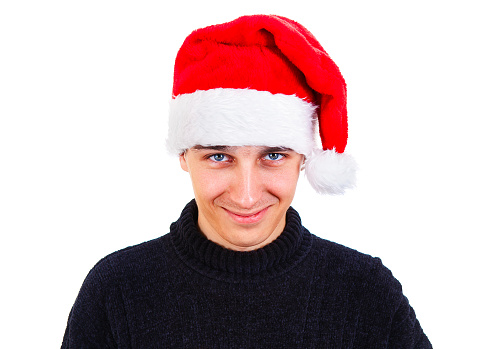 Young Man Portrait in Santa Hat Isolated On The White Background