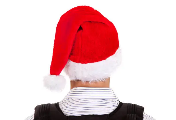 Rear View of a Man in Santa Hat Isolated on the White Background
