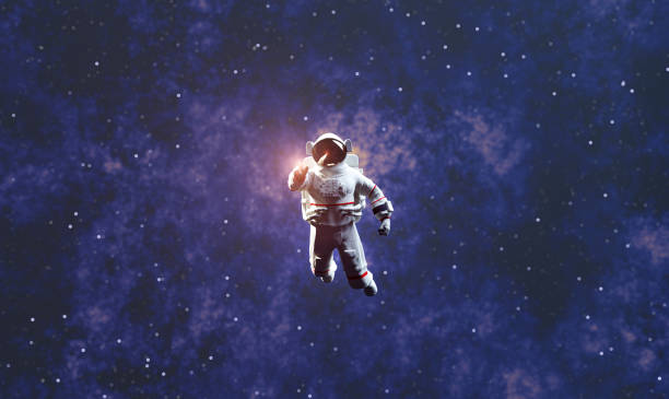 istock Astronaut spacewalk in space and touching orb of light. 1407996612