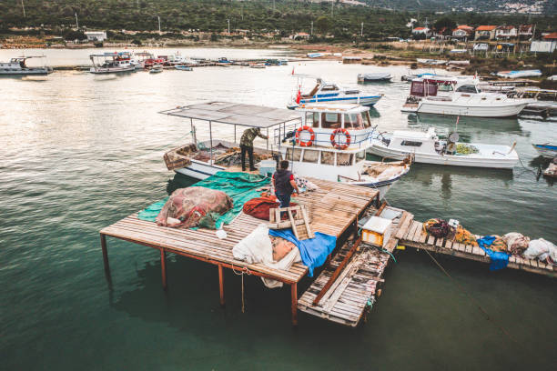The bustle of fishermen early in the day.