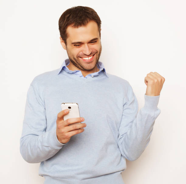 istock Young business man using mobile phone 1407999001