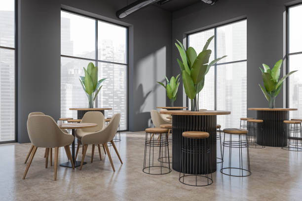 istock Stylish cafe interior with table and seats, eating area and panoramic window 1408000121