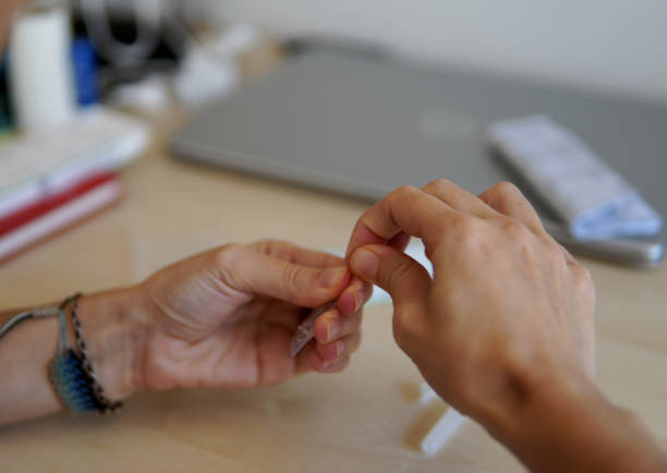 istock a woman preparing the virus test tube 1408001709