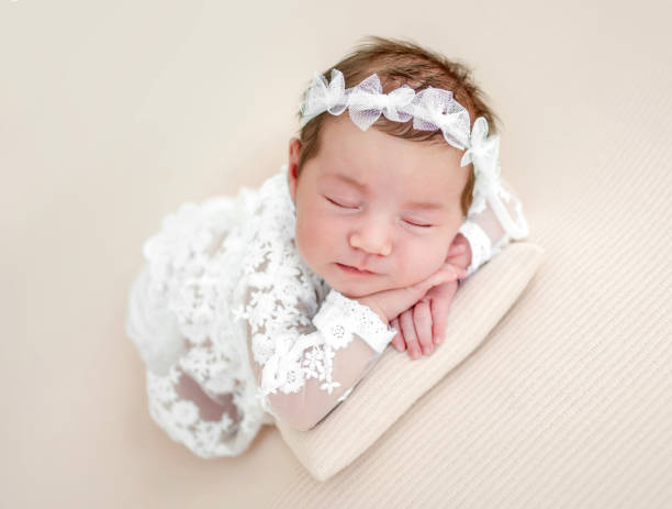 istock Newborn girl studio portrait 1408002290