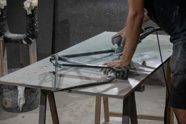 istock man working with a alloy bicycle frame close-up 1408003478