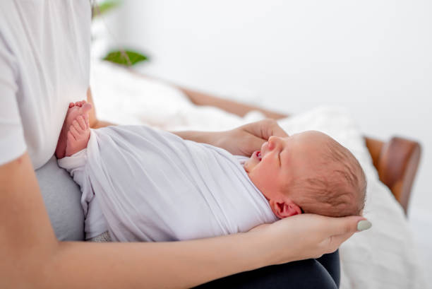 istock Mother with newborn baby 1408003712