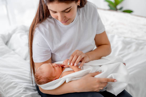istock Mother with newborn baby 1408003744