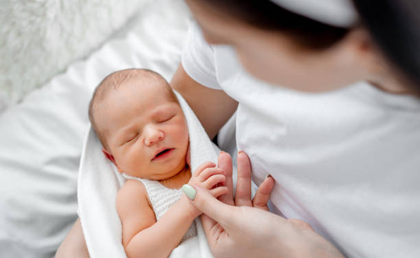 istock Mother with newborn baby 1408003754