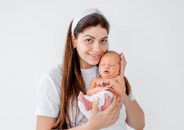 istock Mother with newborn baby 1408003766
