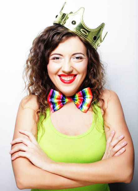Happy young woman holding a gift box