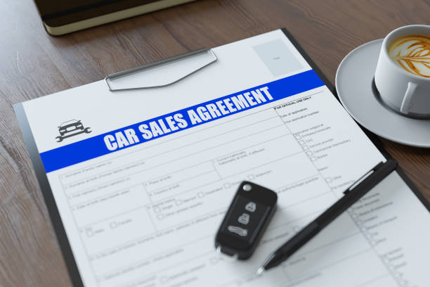 istock Car Sales Agreement Form with a Car Key 1408004911