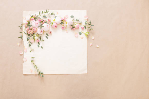 istock beautiful roses on background  old paper 1408006109