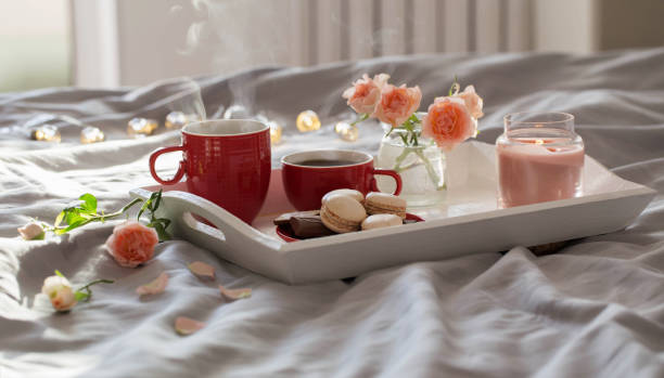 istock two red cups of coffee and flowers on bed 1408006122