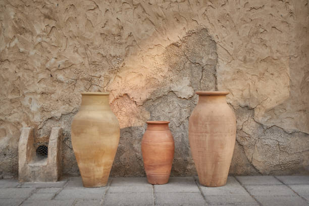 istock Earthen pots kept near old heritage building at Al Seef, Dubai, UAE 1408007656