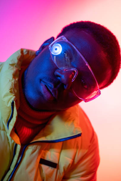 istock neon portrait vivid face stylish man bright light 1408007897