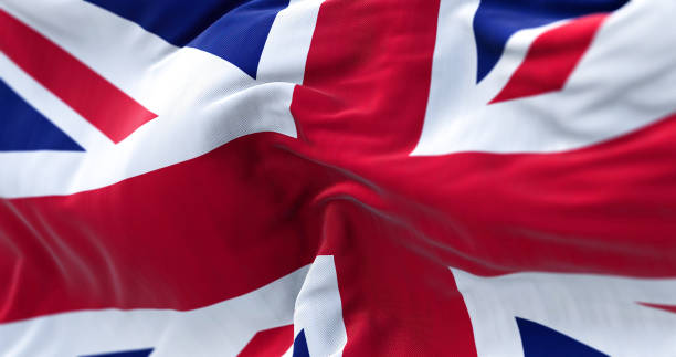 close-up view of the united kingdom flag waving in the wind - british flag freedom photography english flag imagens e fotografias de stock