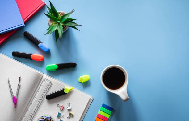 istock School supplies stationery on a blue background, copy space. 1408010425