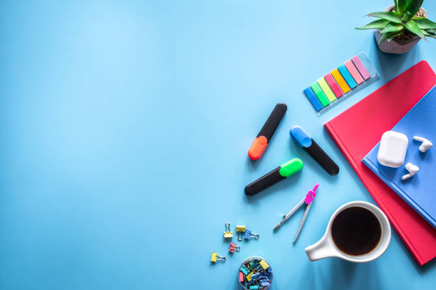 istock School supplies stationery on a blue background, copy space. 1408010439