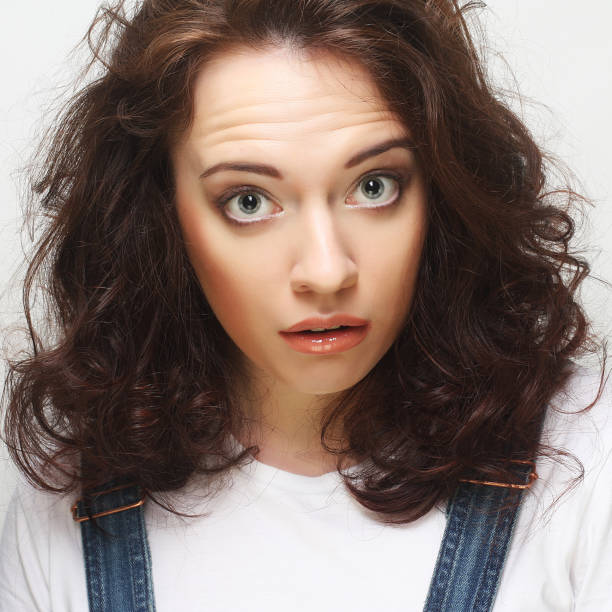 istock Beautiful young surprised woman. 1408010959